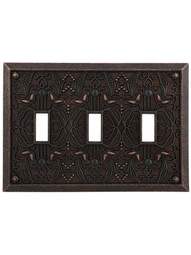 Filigree Triple-Toggle Switch Plate in Aged Bronze.